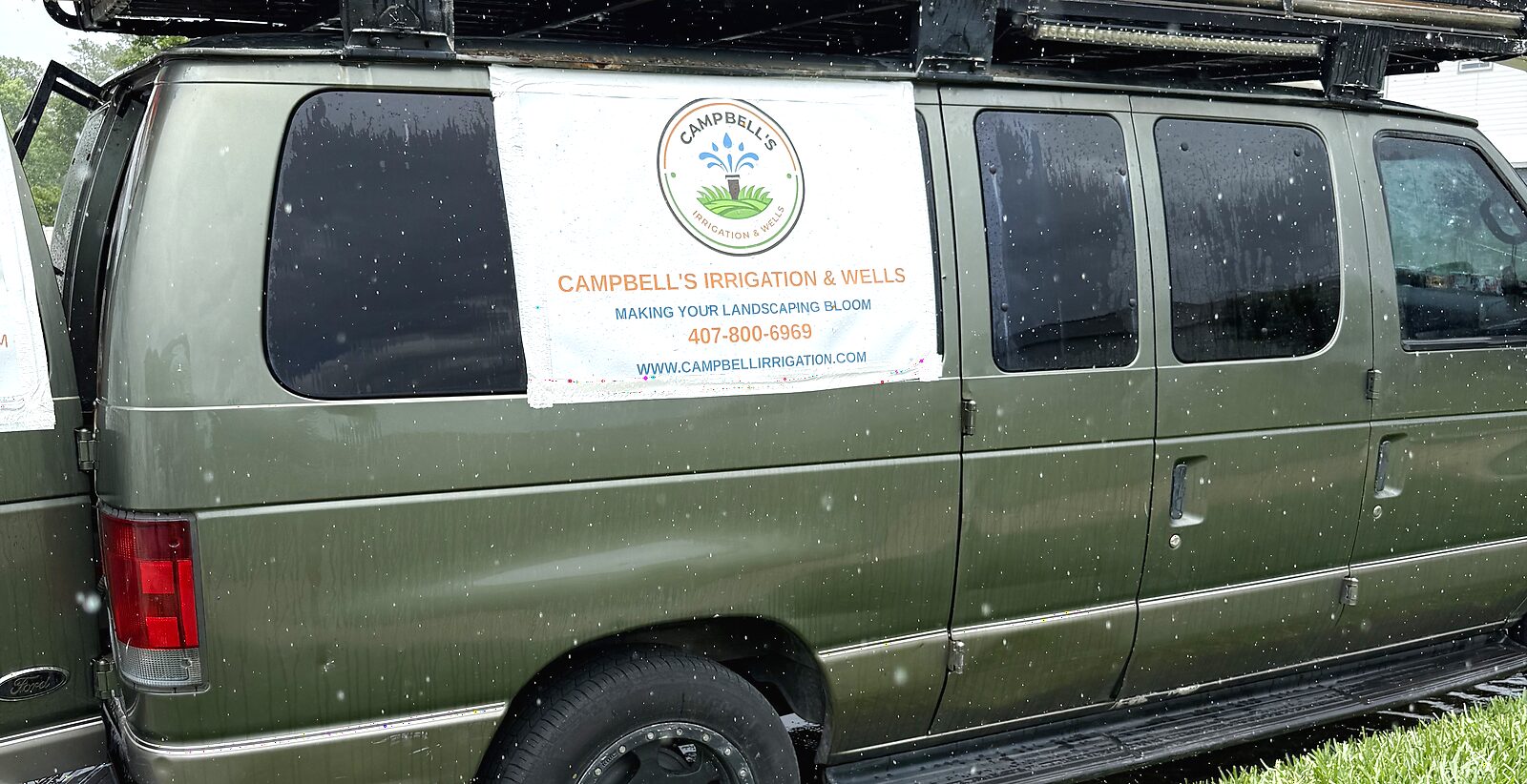 Campbell's Irrigation & Wells service van with company banner